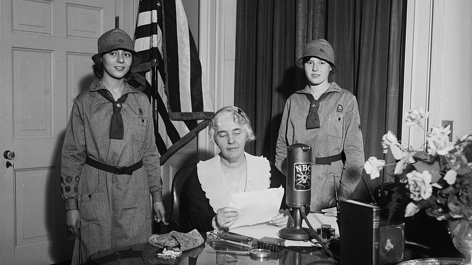 Lou Hoover with young members of the Girl Scouts