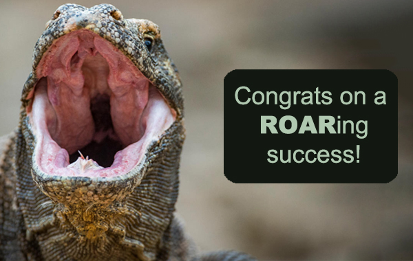 a komodo dragon with open mouth and copy that says Congrats on a ROARing success!