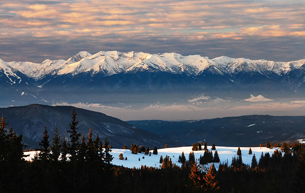 Snowy mountains and a cloudy sky from Pirin National Park in Bulgaria