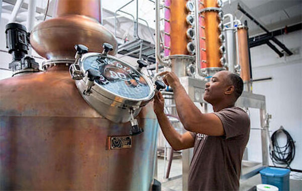 Man operating a distillery