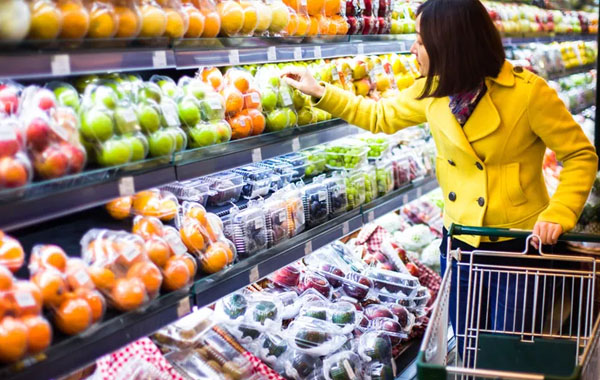 Person shopping in produce section