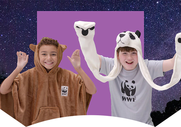 two kids with panda apparel in front of purple square in front of starry background