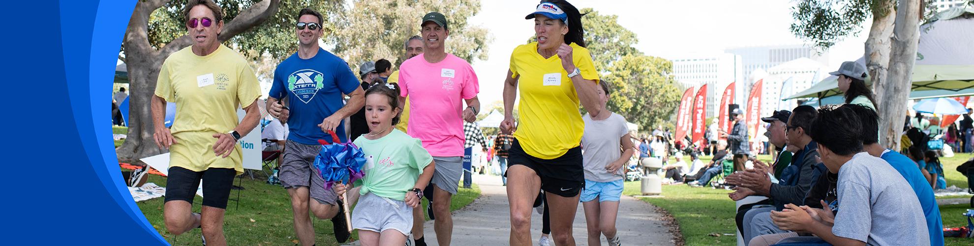 young girl running with family