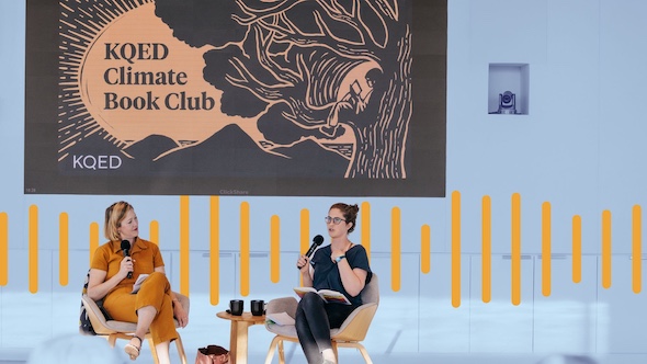 Two reporters sit in chairs and have a discussion.