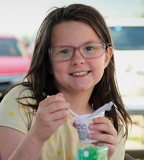 Child with yogurt.