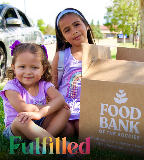 Children with food boxes.