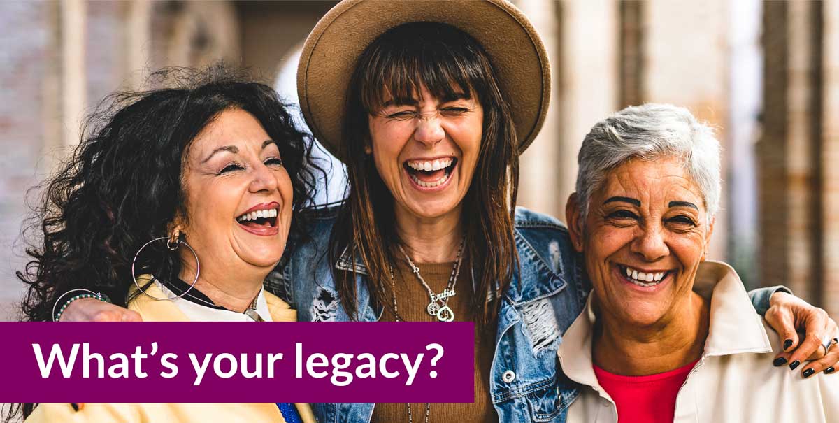 Three happy, diverse women with their arms around each other, with an overlay of text that says