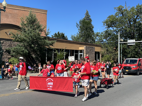 NYSNA members in Massena carry a NYSNA banner in a Labor Day parade.